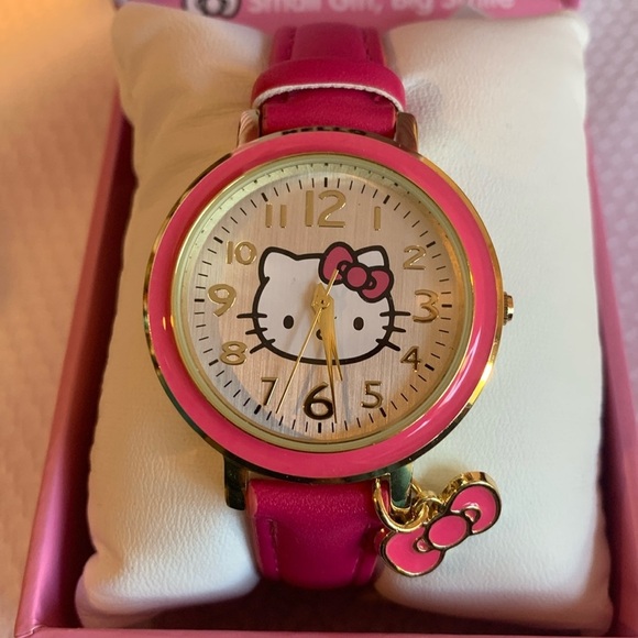 NWT Hello Kitty Analog Watch Pink Band Pink and Gold Tone Bezel with Bow Charm - Picture 1 of 4